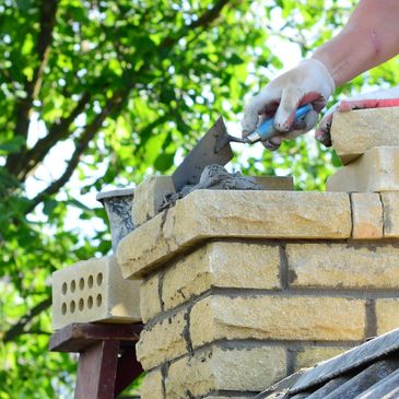Masonry brick repair detail on an exterior chimney wall