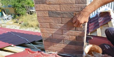 Chimney crown surface repaired and sealed against moisture